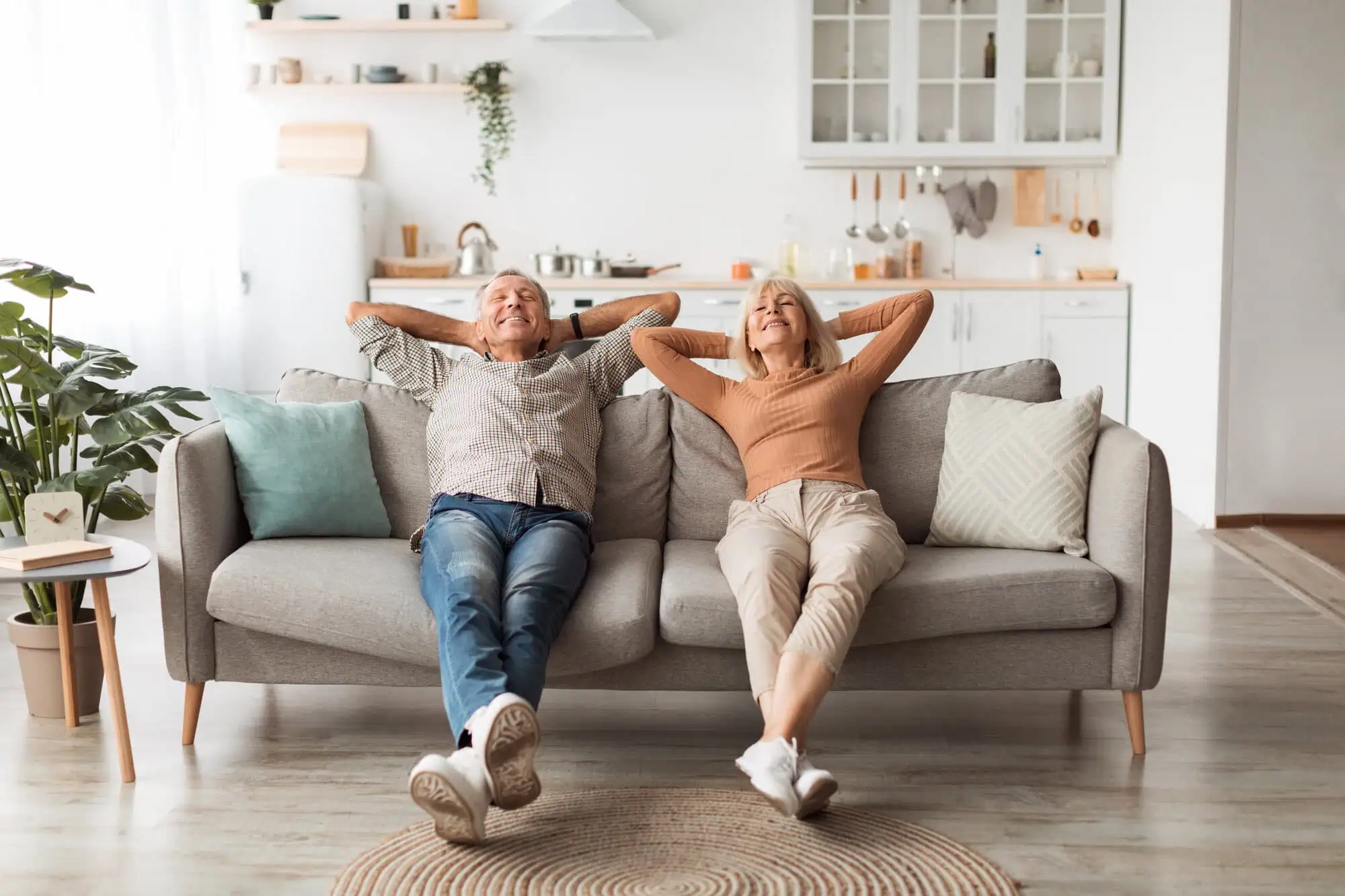 A couple reclining on a couch