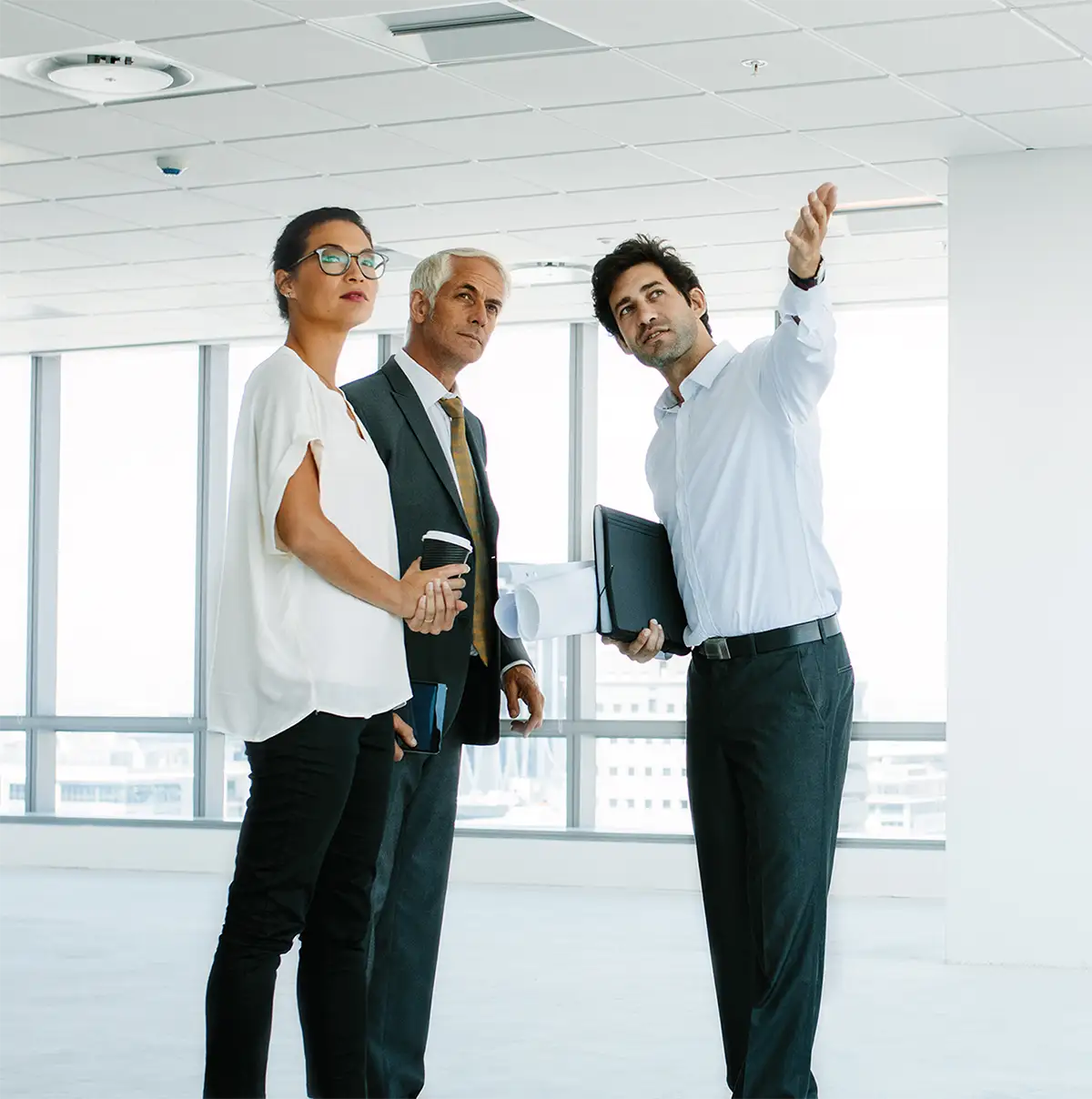 business people in empty building