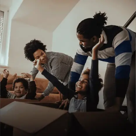 Family playing with boxes
