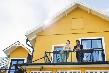 couple standing on a balcony