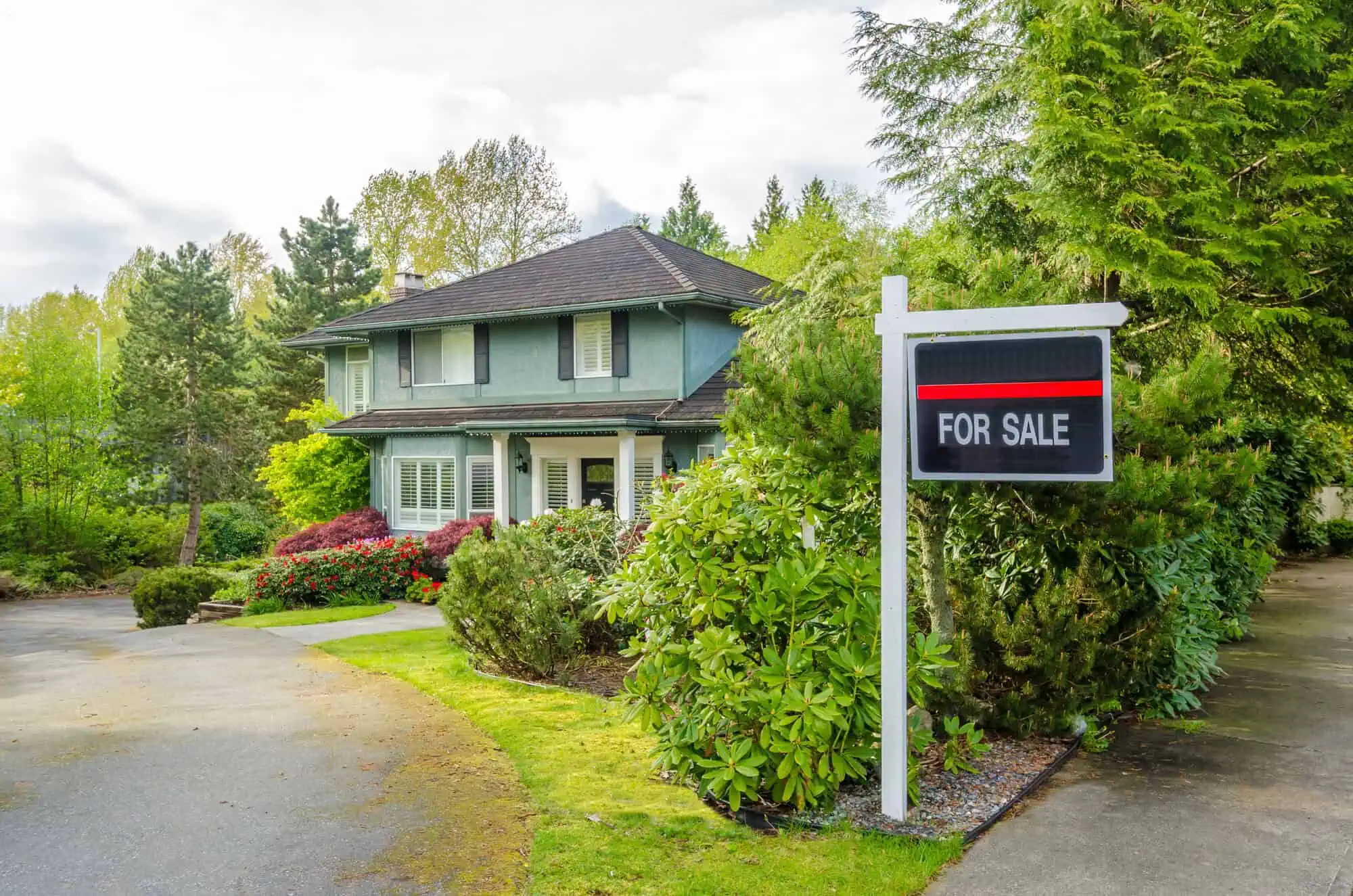 House with for sale sign