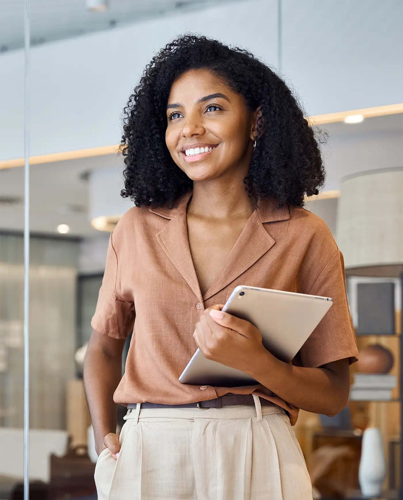 woman smiling with tablet