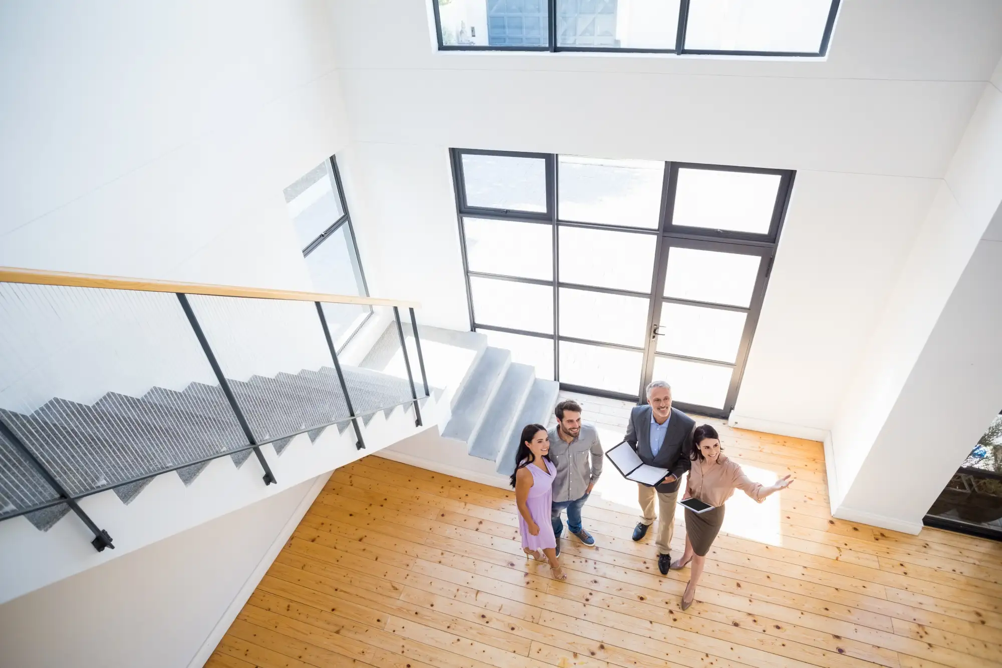agents showing house to couple