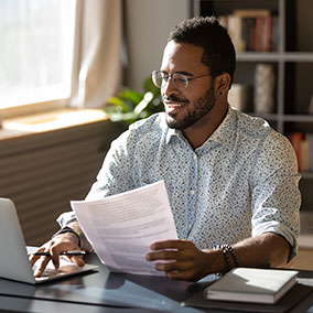 Man reviewing loan estimate