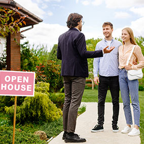 First time home buyers talking to realtors